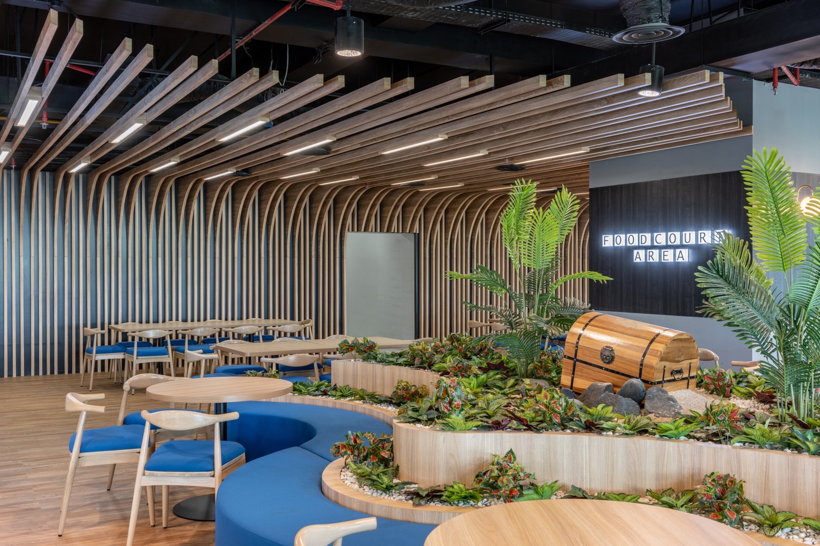 A foodcourt with green ornament and wooden style
