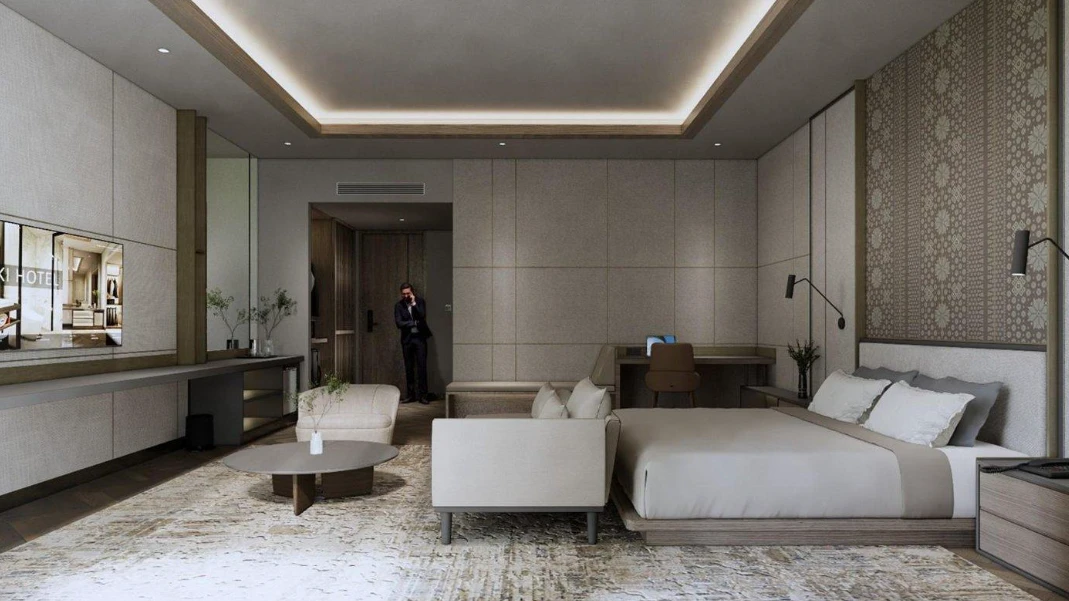 Suite dengan warna earthy dan pencahayaan lembut yang memberi rasa rileks bagi tamu.