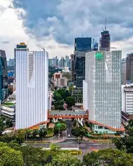 Fasad yang Berkomunikasi dengan Kota: Bagaimana Menara Danareksa Merespon Monas, Istana Negara, dan Istiqlal
